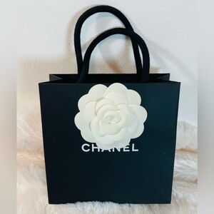 CHANEL Black tiny paperbag